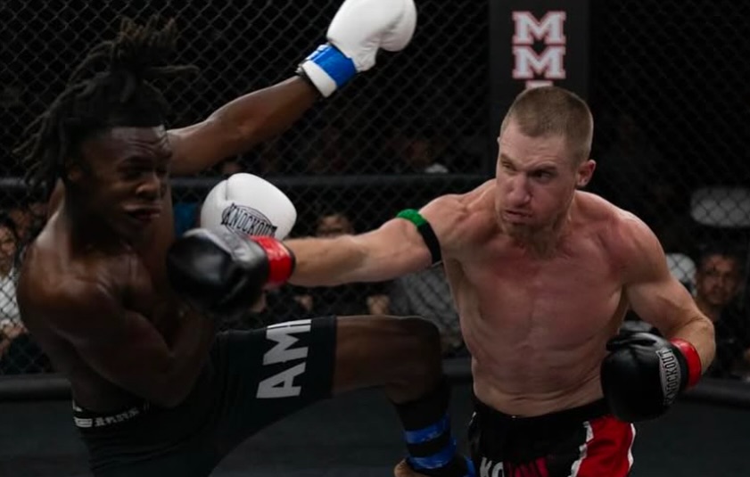 KO Zone fighter landing head kick during competition