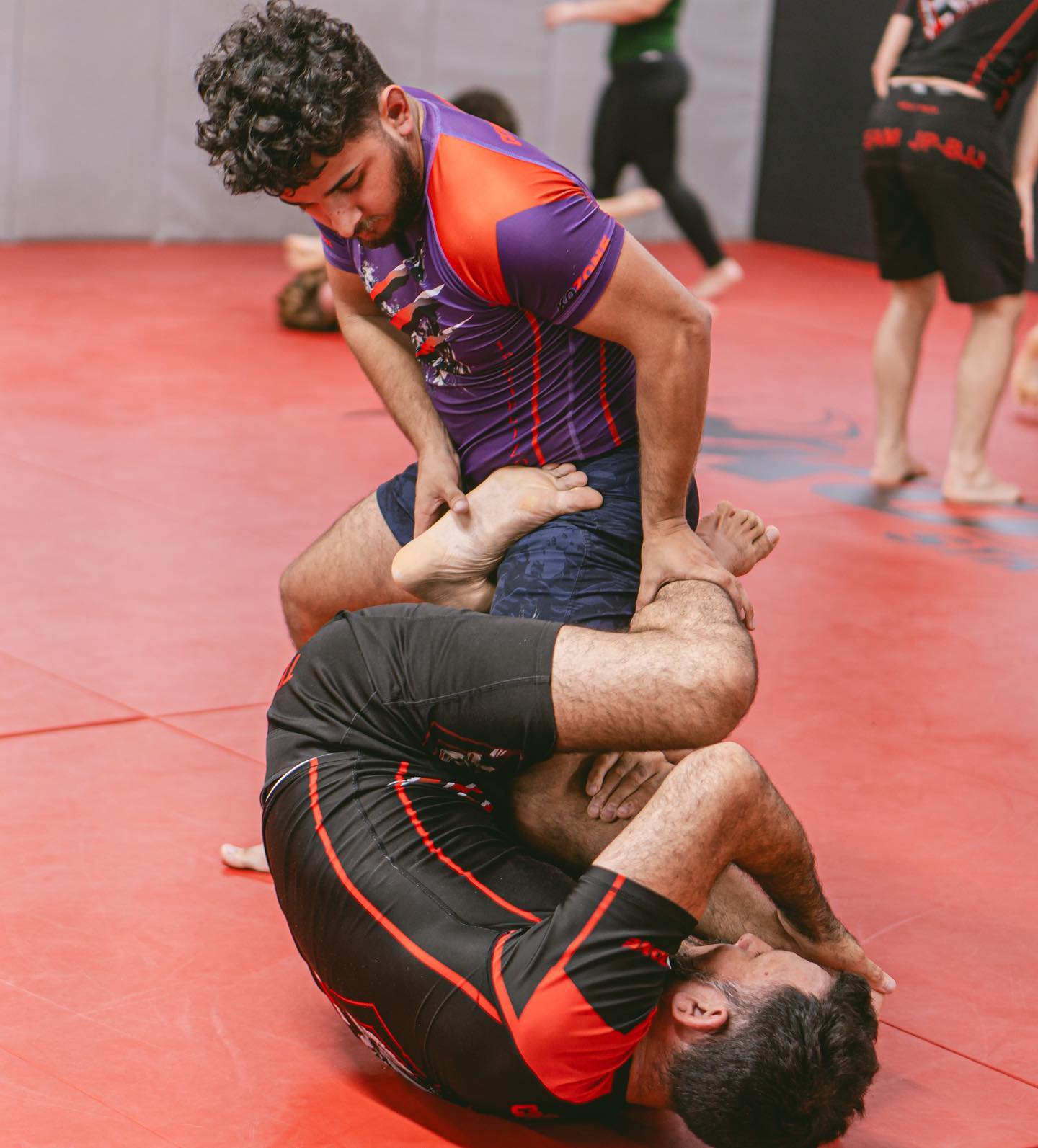 KO Zone MMA fighter victory celebration in the cage