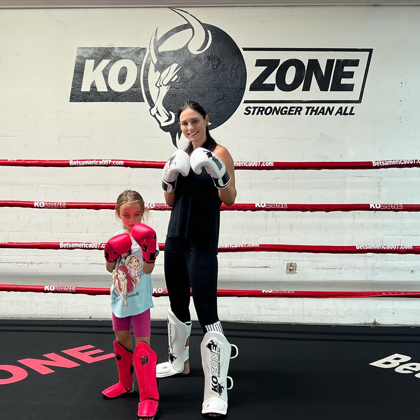 Mother and daughter training together in kickboxing class at KO Zone Miami